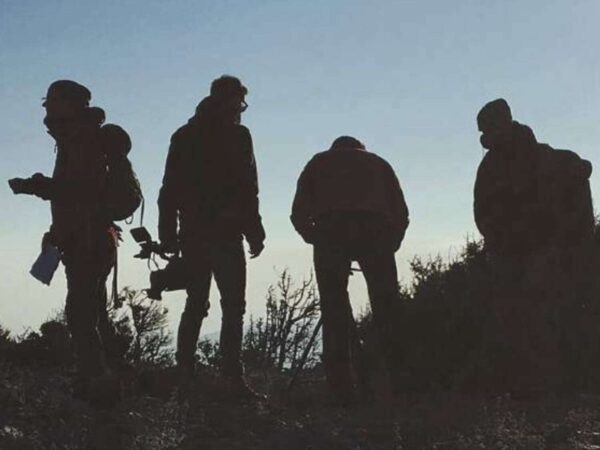 People on set at dusk - Cineklee